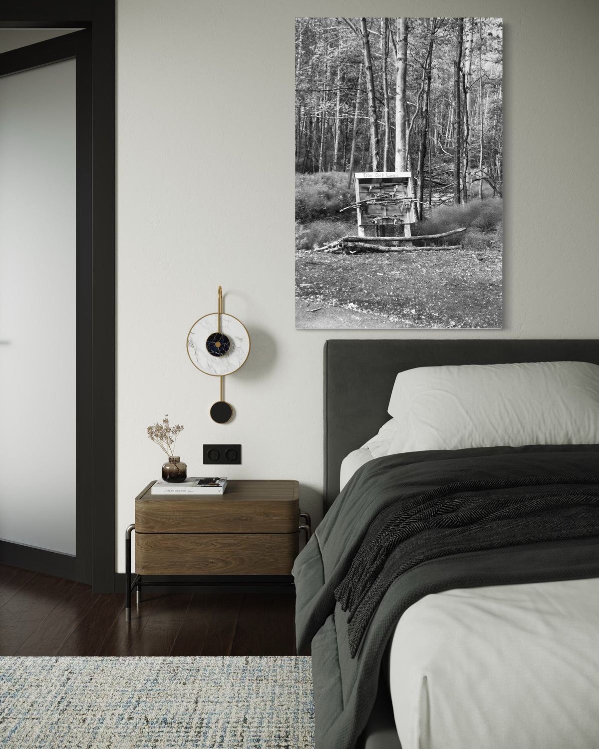 Dog Stick Library black and white wall art in a minimalist room, shown for scale