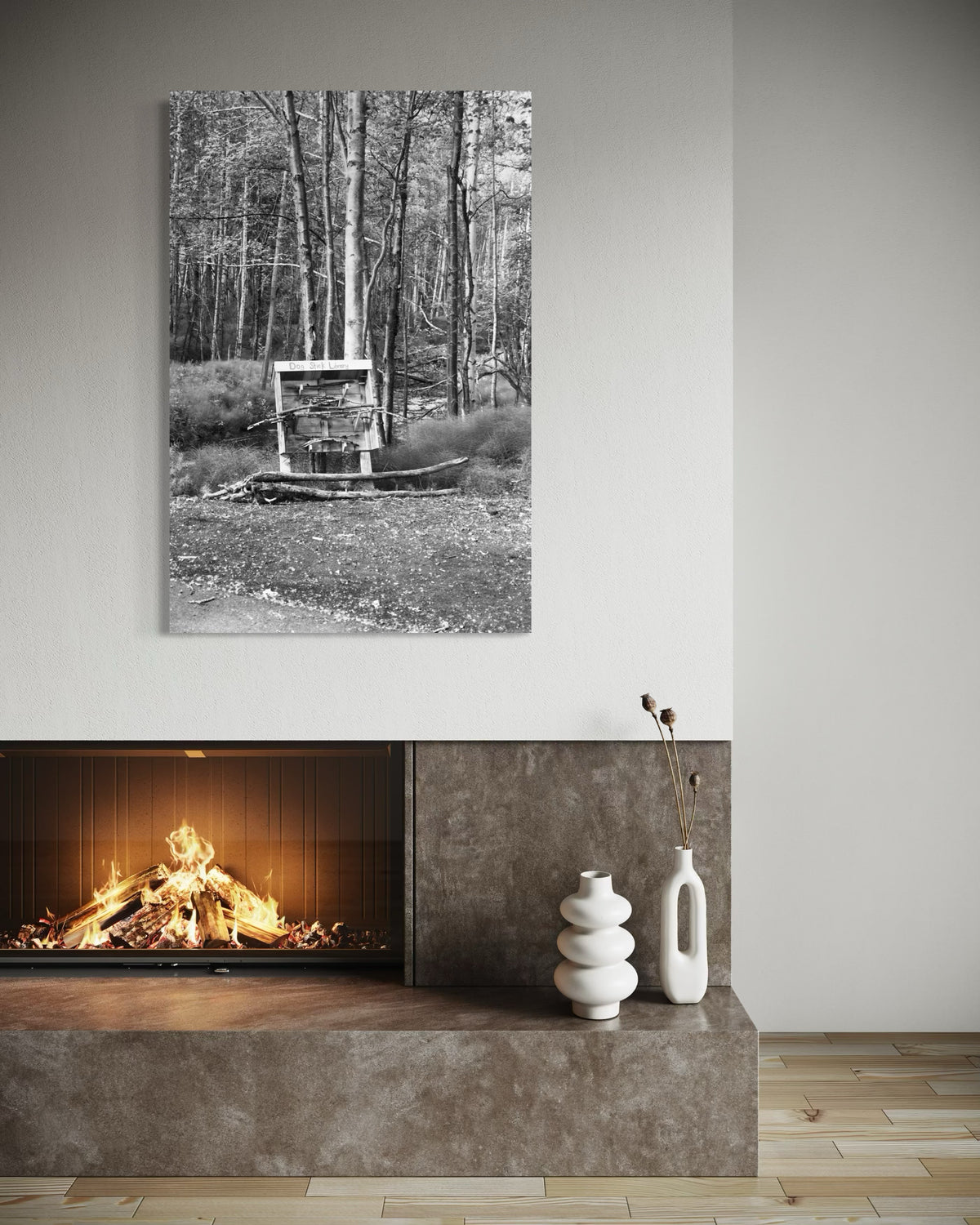 Dog Stick Library black and white print by SDPhotography shown on a wall in a styled room