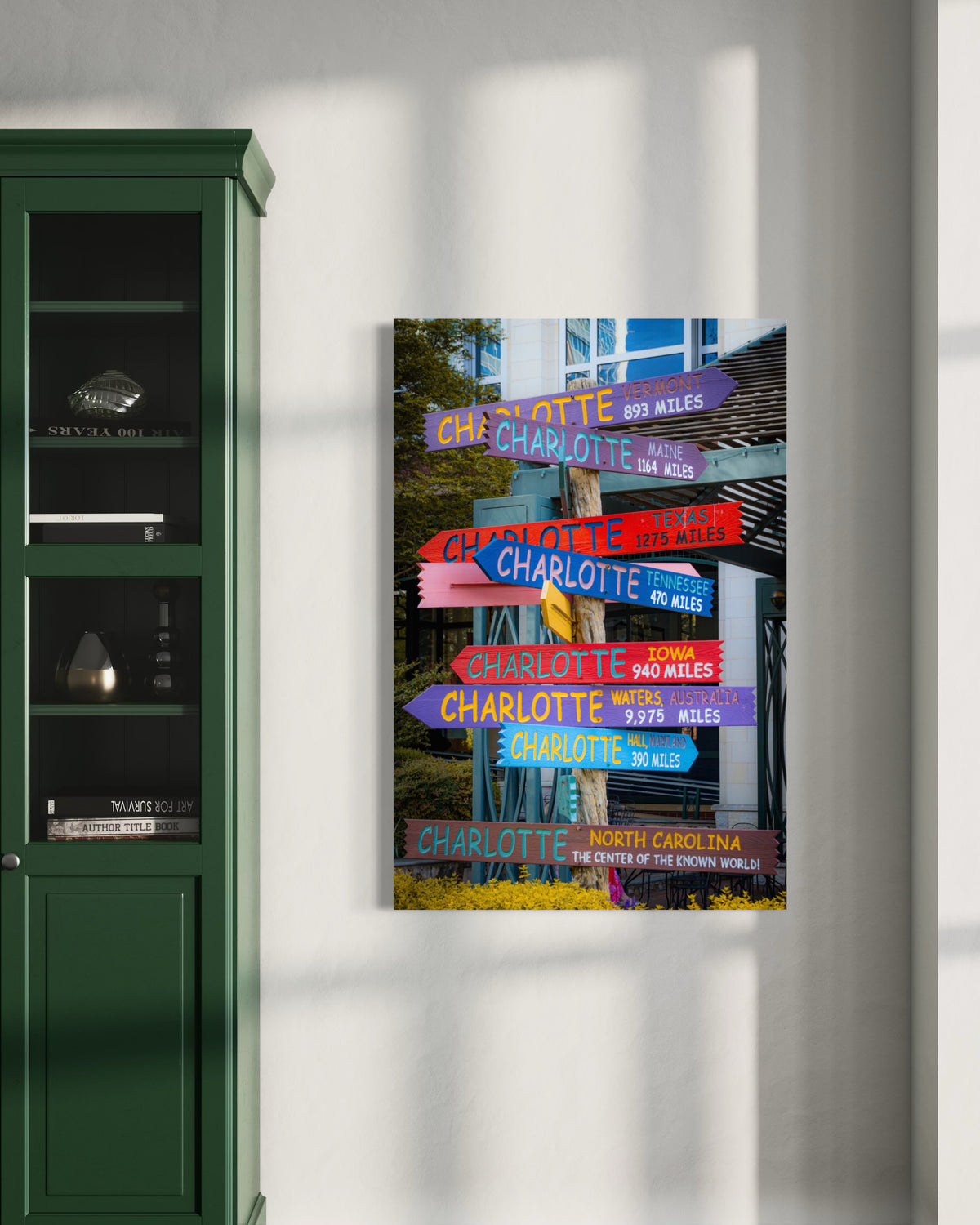 Directions print on a sunlit white wall beside a green cabinet with glass doors